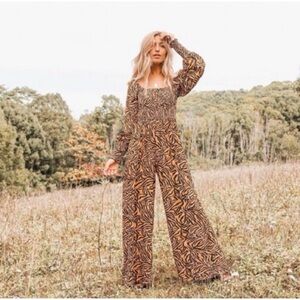 Kachel x Anthropologie Tiger Striped Smocked Wide Leg Jumpsuit size 4